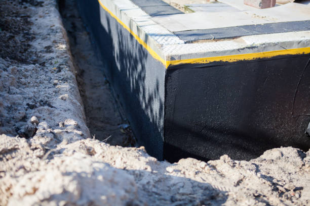 Professional Waterproofing technician working in McCalla, AL